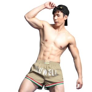 Men's khaki quick-dry fitness shorts with elastic waist and stylish printed lettering