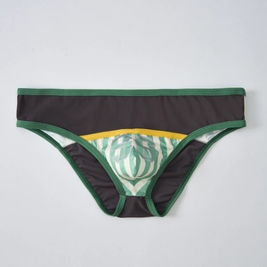 Detail of men's low-rise briefs featuring contrast mesh side panels and number 58 print