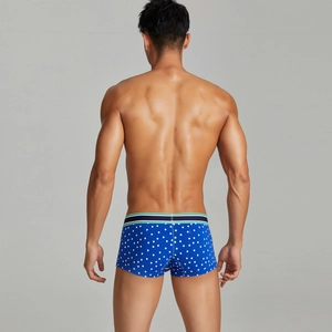Back view of men's blue boxer briefs with white snowflake print and striped elastic waistband