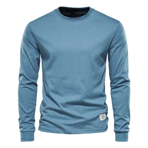 Detail of the grey blue long sleeve t-shirt neck collar and woven brand label