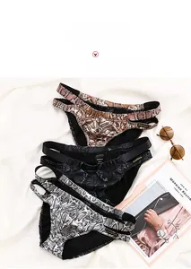 Flat lay of men's faux snake skin briefs with side cut-outs and elastic waistbands
