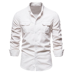 Detailed close-up of men's corduroy shirt featuring double chest flap pockets and button closure