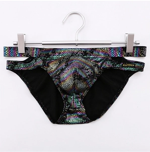 Detail of metallic snakeskin briefs for men with side cut-outs and iridescent finish