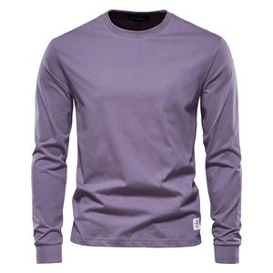 Close-up of crew neck detail and logo tag on a lilac long-sleeved cotton t-shirt