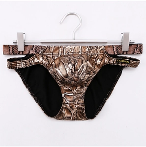 Detail of faux snakeskin mens briefs featuring sexy hollow-out side straps and U-convex pouch
