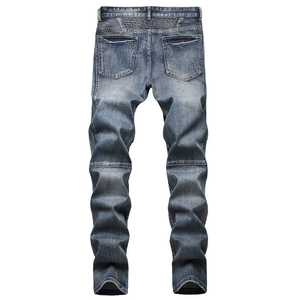 Men's vintage medium blue slim straight jeans with retro zipper and seam details