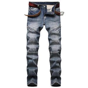 Men's vintage distressed slim fit jeans with decorative zippers and a brown leather belt