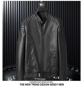 Close-up of quilted shoulder detailing and stand collar on black leather biker jacket