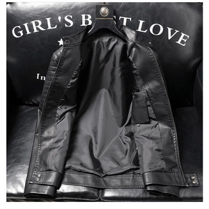 Detail view of men's faux leather motorcycle jacket with zipper collar and metal buttons