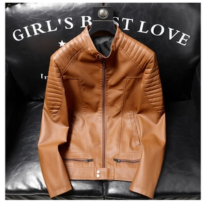 Detail of tan PU leather jacket showing quilted shoulders and a stylish stand collar