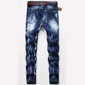 Close-up of heavy washed denim texture and distressed patterns on men's straight jeans