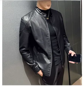 Detail of shoulder quilting and stitching on a black faux leather motorcycle jacket