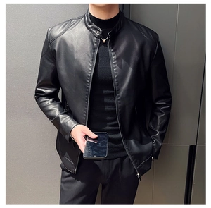 Detail shot of black motorcycle PU leather jacket showing matte texture and stand collar