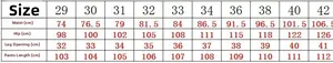 Size chart for men's distressed jeans with embroidery, measurements from 29 to 42 in cm