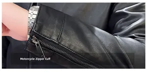 Close-up of black biker leather jacket featuring silver metal zipper cuffs and texture