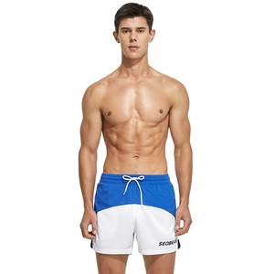 Men's athletic color-block running shorts in navy blue and white with adjustable drawstring