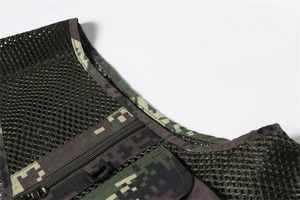 Detail of army green digital camo mesh vest showing zipper pocket and D-ring hook