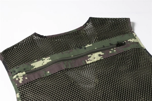 Detail view of digital camouflage mesh vest with large breathable back panel and zippered pocket