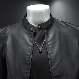 Men's vintage black faux leather biker jacket with stand collar and metallic button detail