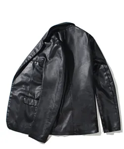 Detailed view of black PU leather jacket texture with classic suit collar design