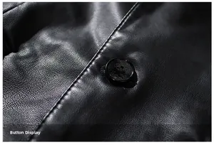 Close-up of circular button and fine leather texture on black casual jacket for men