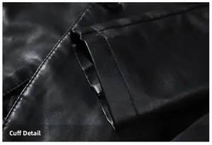 Close-up of black PU leather jacket cuff showing detailed grain texture and neat stitching