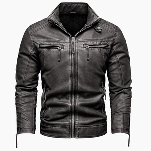 Detail of vintage gray motorcycle jacket featuring stand collar and ribbed shoulder seams