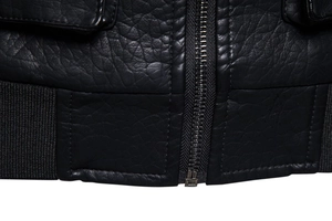 Close-up of men motorcycle jacket with metal zipper, flap pocket and rib-knit cuffs