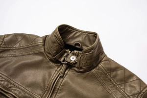 Close-up of stand collar buckle and quilted shoulder detail on men's leather jacket