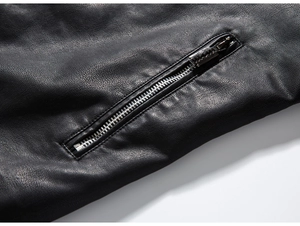 Close-up of premium black PU leather jacket with silver metal zipper pocket detail