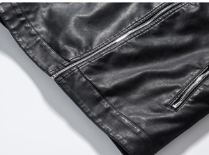 Detail of premium black PU leather jacket showing silver zipper and pebble grain texture