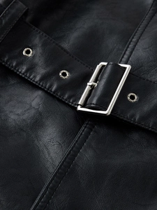 Close-up of black PU leather coat belt with silver metal buckle and textured finish