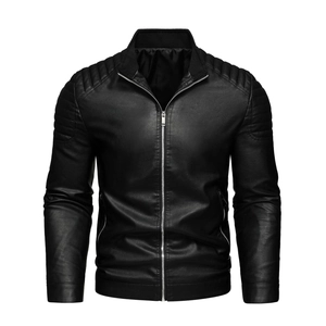 Detailed view of quilted shoulders and stitching on a black faux leather biker jacket