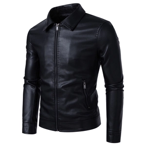 Detail of classic black PU leather jacket showing lapel collar and metal zipper pocket