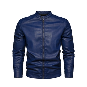 Detail of navy blue faux leather motorcycle jacket with quilted shoulder and metal zipper