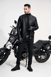 Detail of a men's vintage black PU leather biker jacket with a classic stand collar