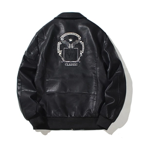 Detail of classic black PU leather bomber jacket featuring intricate eagle embroidery on back