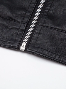 Detail view of smooth black PU leather jacket featuring a silver metal zipper and stitching