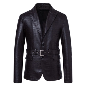 Detail of dark brown faux crocodile embossed leather texture on biker jacket with belt