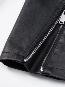 Close-up of black PU leather jacket featuring lychee texture and silver metal zipper detail