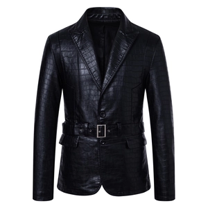 Close-up of black crocodile embossed faux leather jacket with adjustable waist belt detail