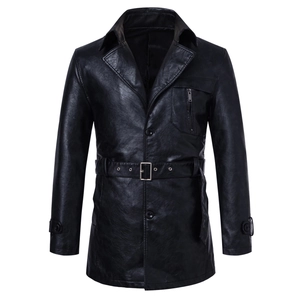 Detail of the high-quality black PU leather texture with waist belt and lapel collar