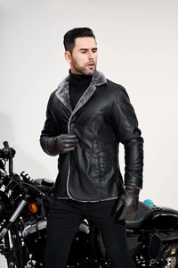 Detail of men's PU leather jacket with gray faux shearling collar and button closure