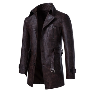 Detail of dark brown faux leather trench coat with waist belt and silver buckle accent