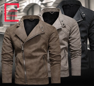 Detail of men's biker jacket showing shoulder quilting and metallic zipper pockets