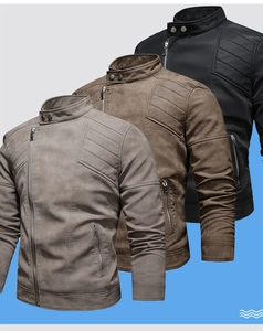 Detail view of motorcycle jacket with asymmetrical zippers and quilted patterns in three colors