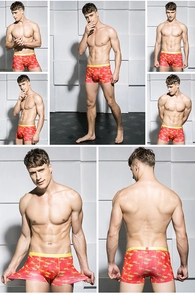 Detail of red and yellow camo boxer briefs showing elastic waistband and high-stretch fabric