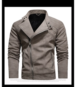 Detail of vintage coffee PU leather jacket showing slanted zipper and quilted shoulders