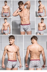 Detailed views of men's floral boxer briefs with a red elastic waistband and slim fit
