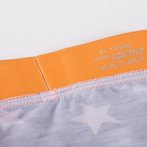 Herren Boxer mit orangefarbenem Gummibund und grauem Modalstoff mit Sternenmuster